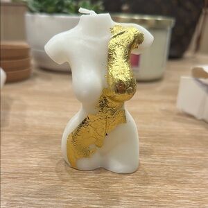 White and gold feminine body candle